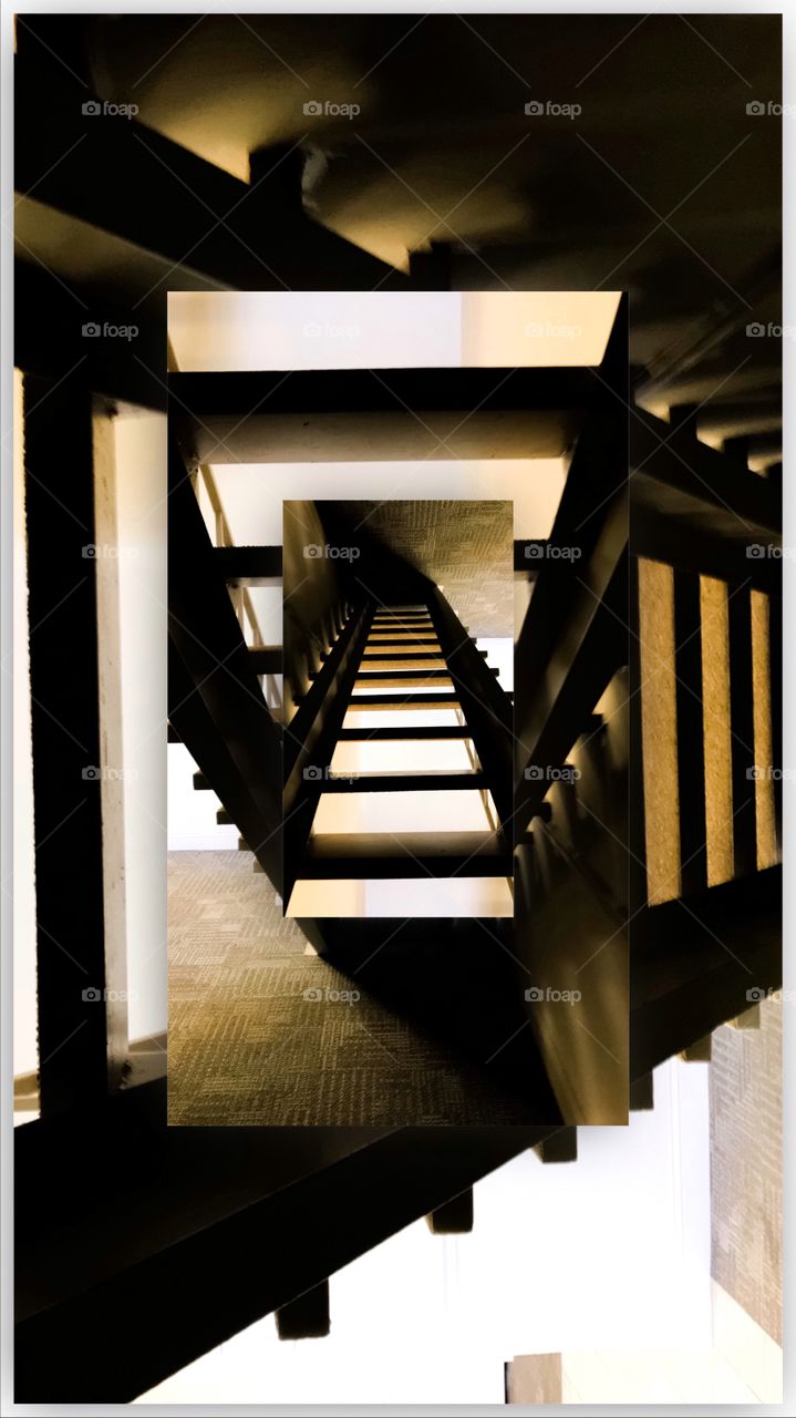 Nightmarish visual of a stairwell photoshopped with mirror images