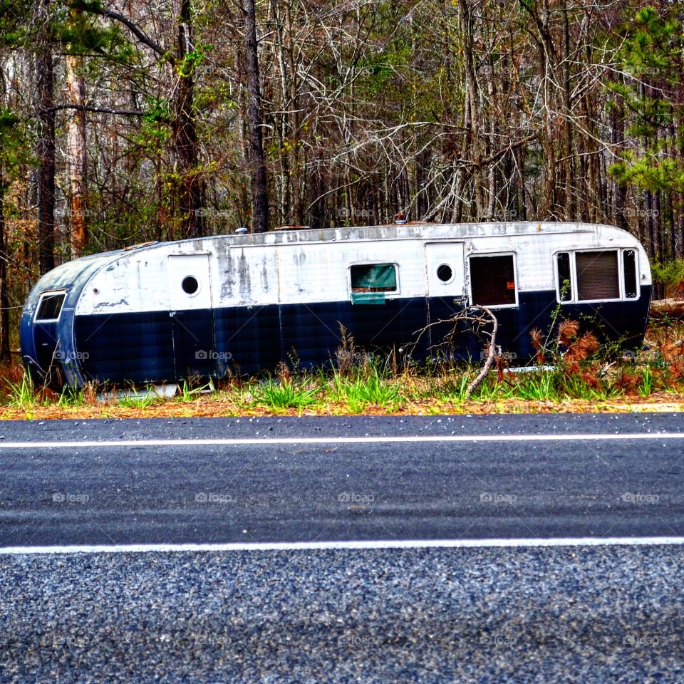 abandoned classic camper.