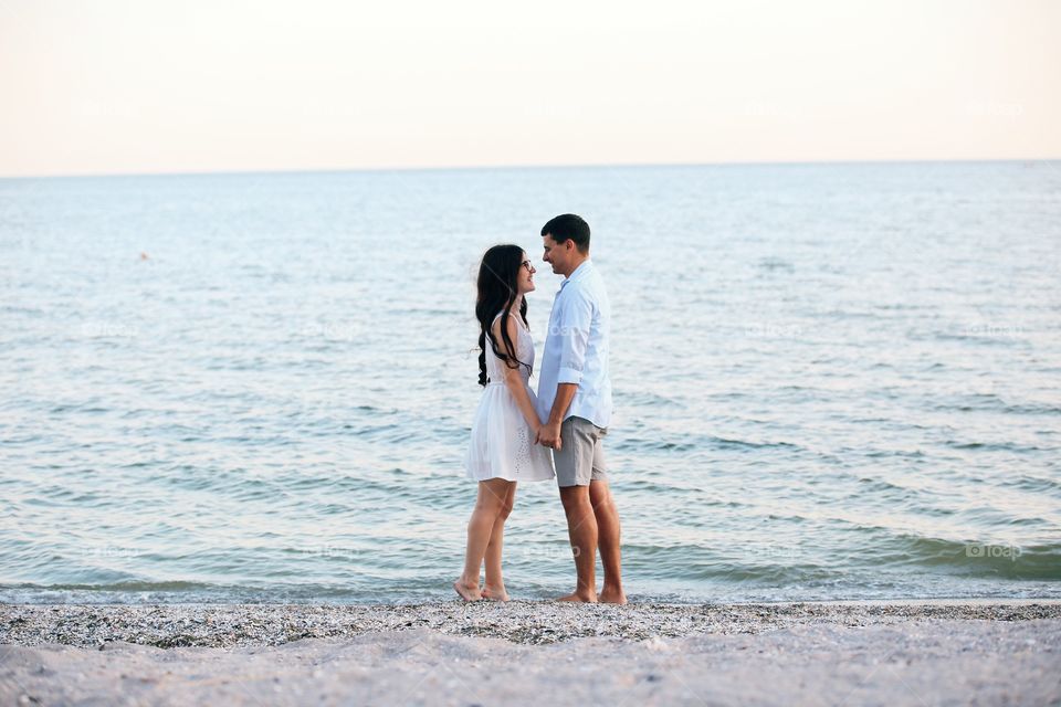 Couple in love. Beautiful view on the sea