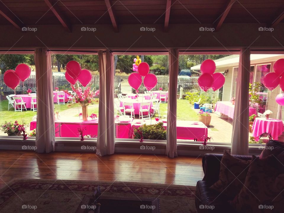 Before the party chairs and tables with pink decorations