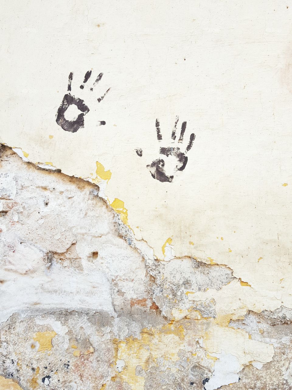 Handprints on an old wall