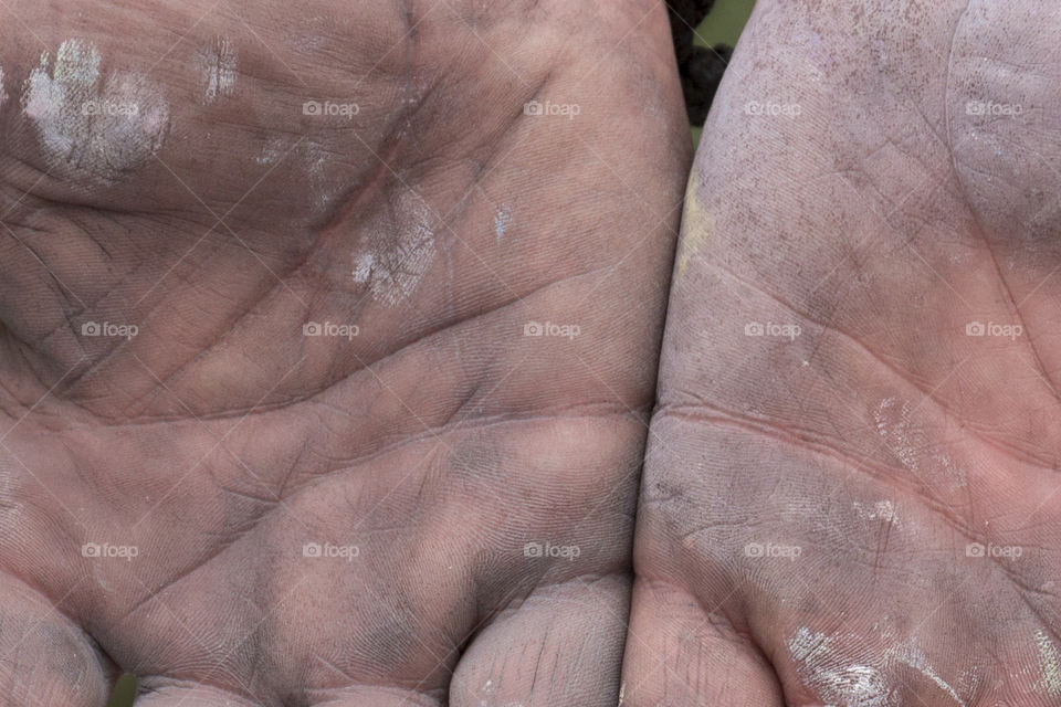 A close up of hands of street artist 