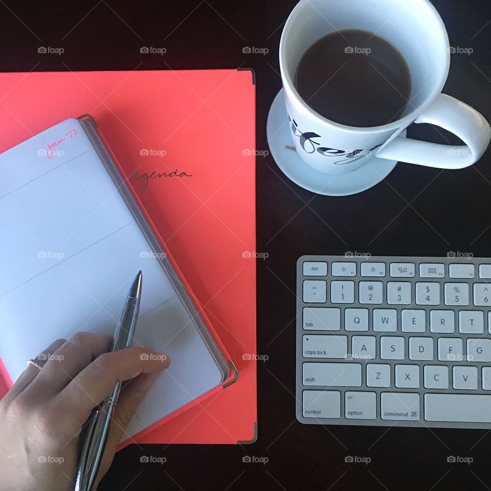 Getting the work day started with coffee and the weekly agenda.