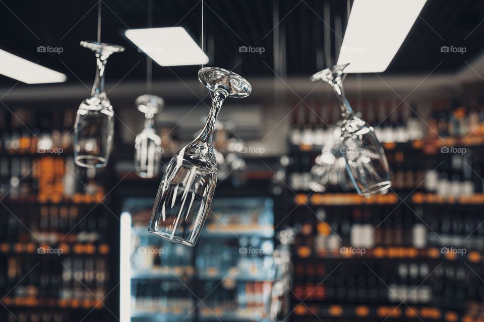 Cafe decorated with glass hanging on rope . Unique interior design