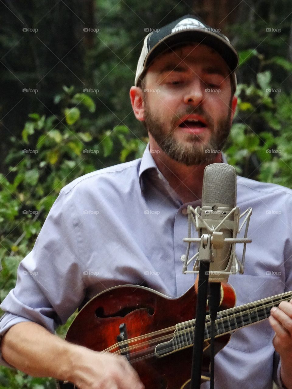 Mandolin Player. Bluegrass Singer With Mandolin
