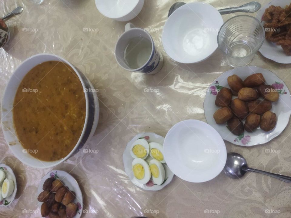 Moroccan table in Ramadan month:  Soup. Date and eggs.