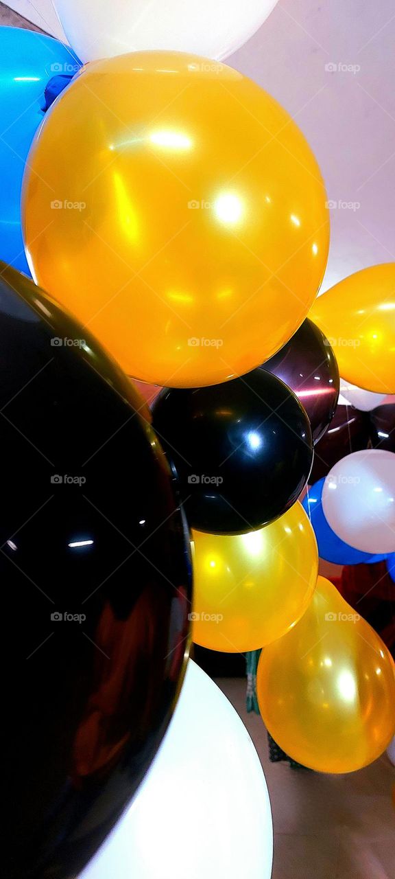 background with yellow and black and white,green balloons bottom shutted