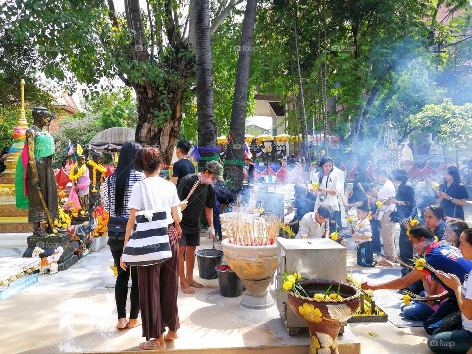 People worship to holy statue in Thailand