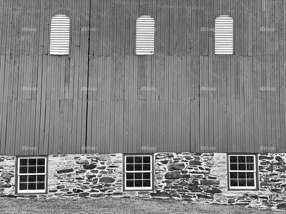 Windows in the side of an old barn