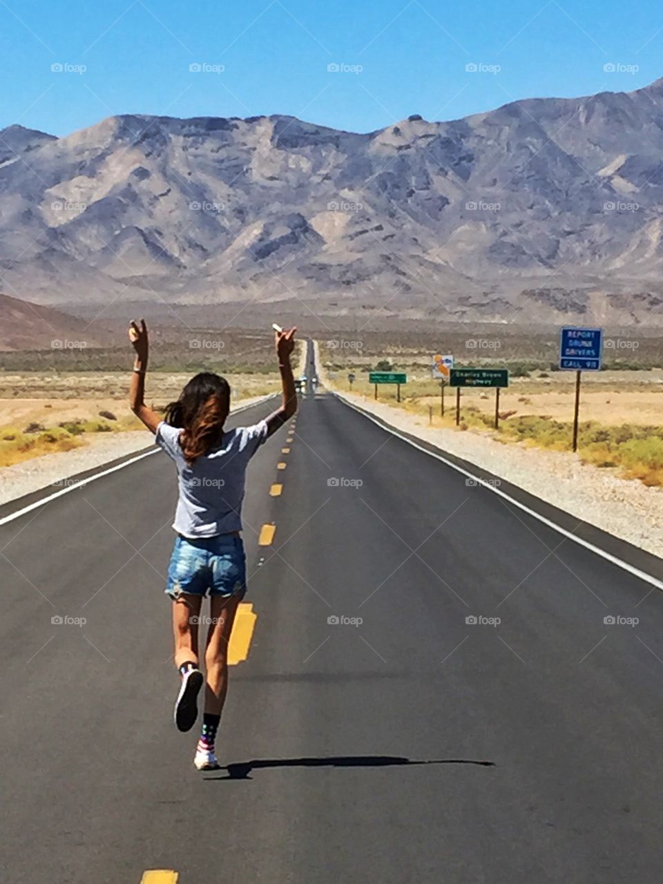 Happy woman on the road