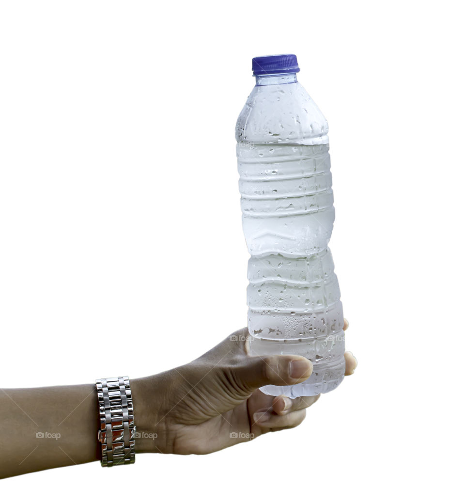 Hand holding Cold water on a white background with clipping path.