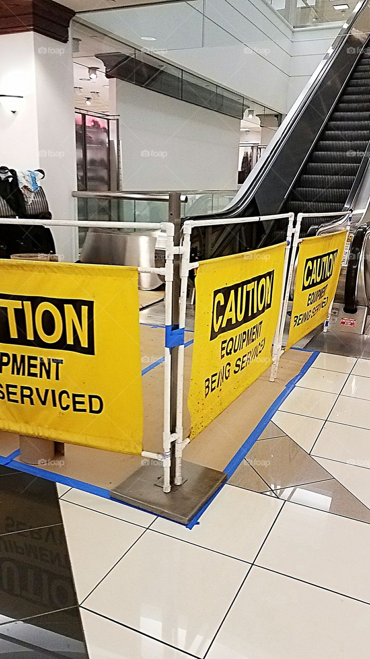 caution signs for escalator repair