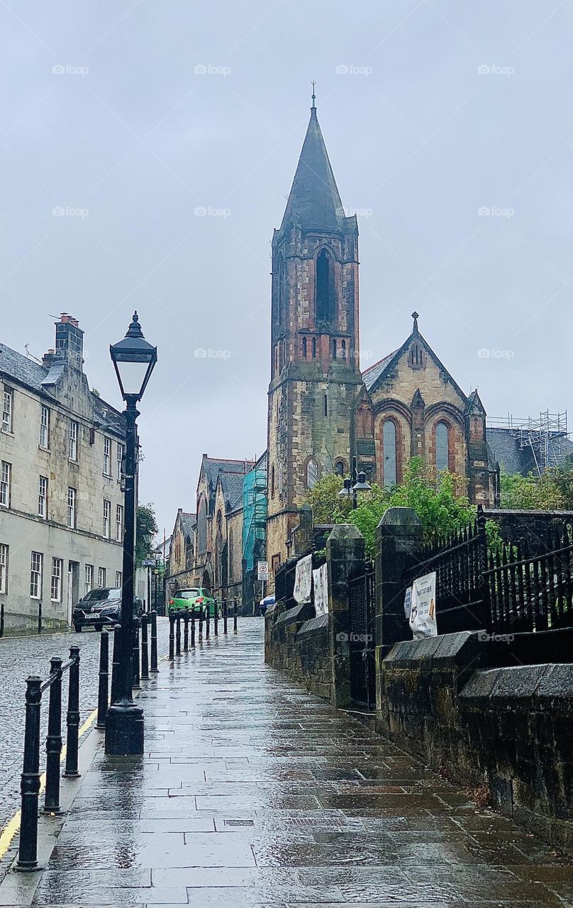 Old street with wet paving stones