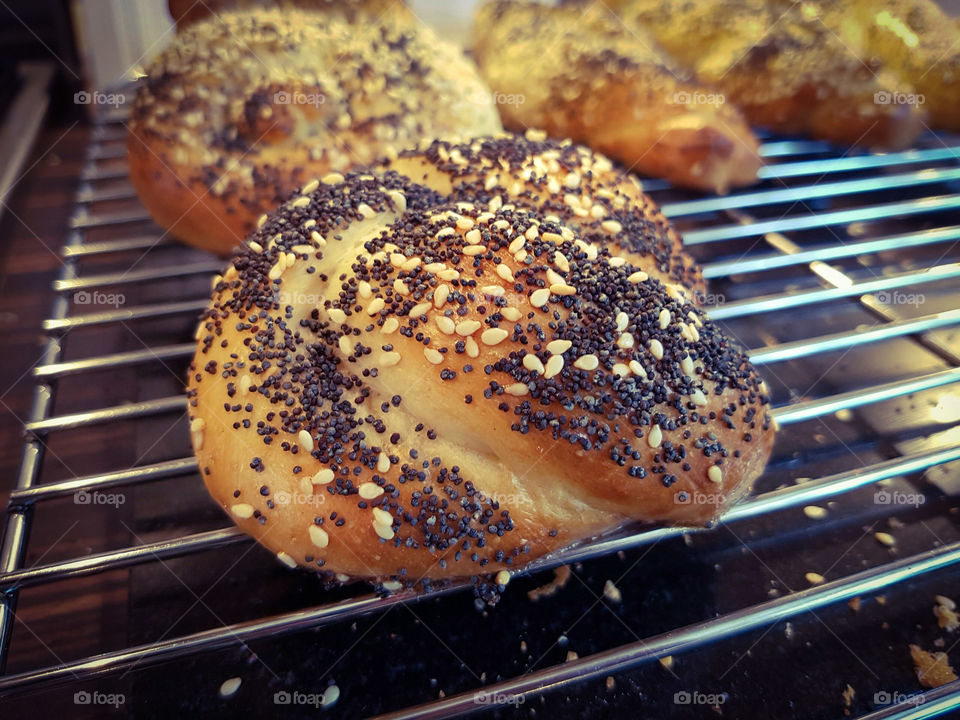 Bread roll bap cob bun with sesame seeds and poppy seeds home made baking.