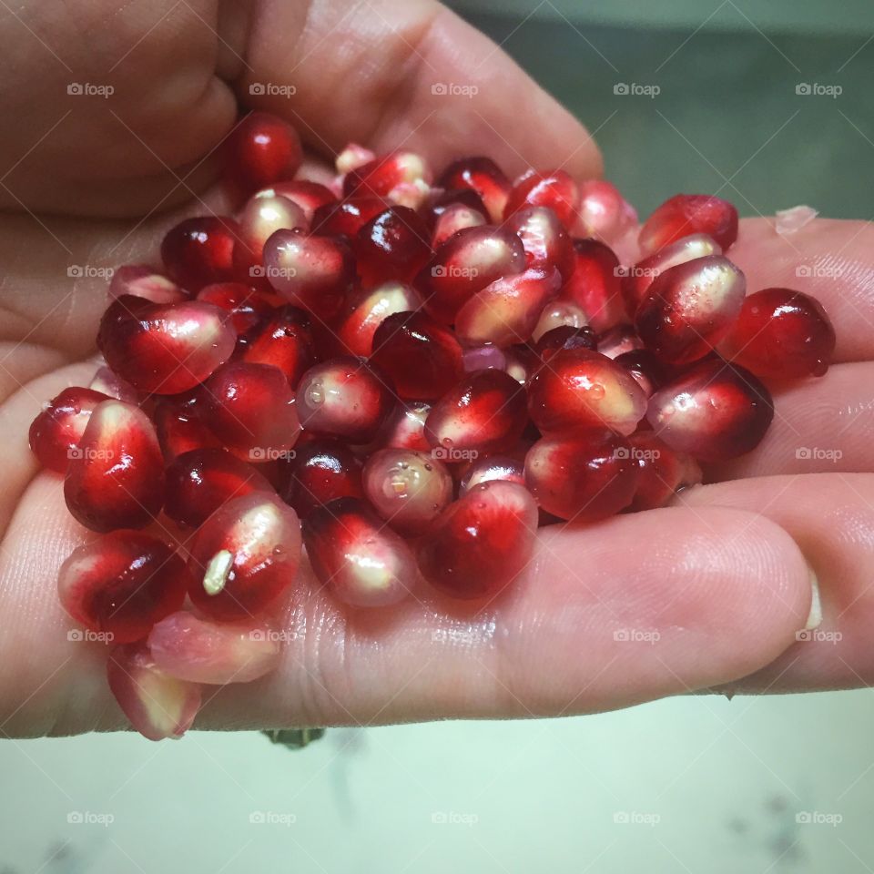 Handful of pomegranate seeds. 