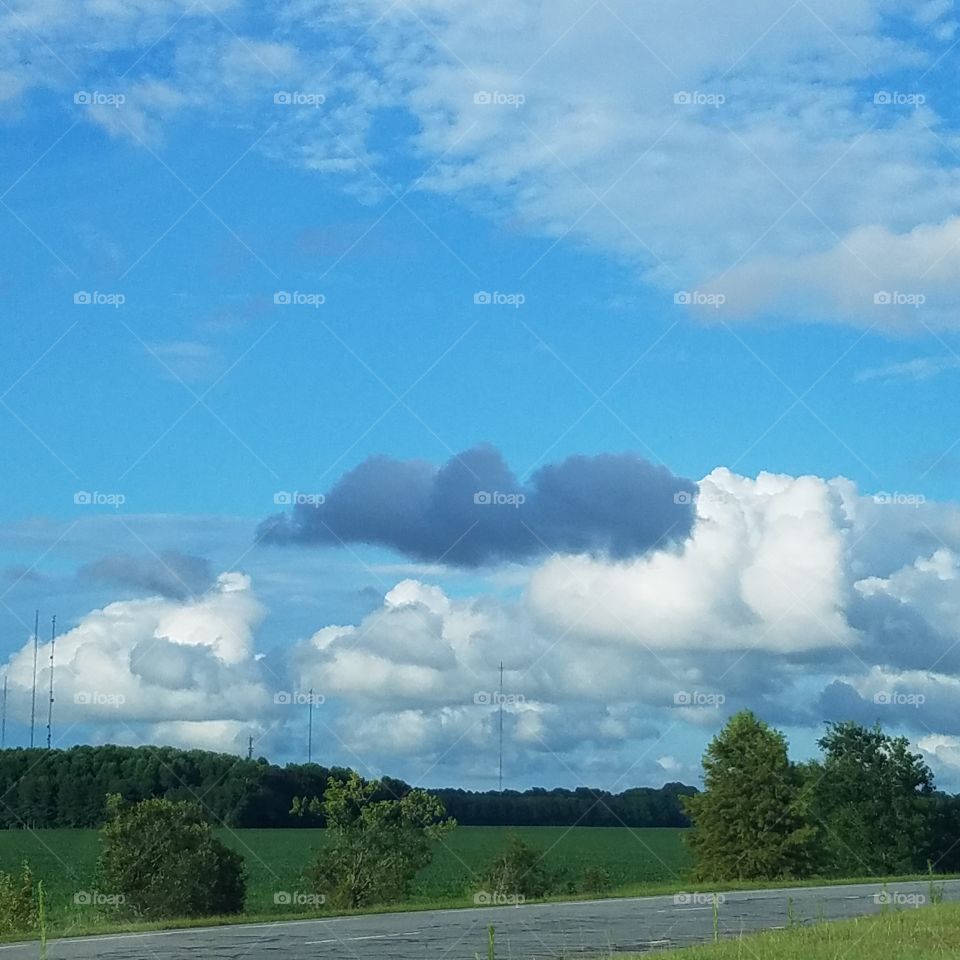 one dark cloud in a blue sky