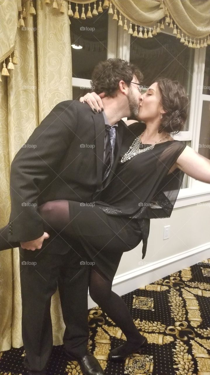 kissing formal couple