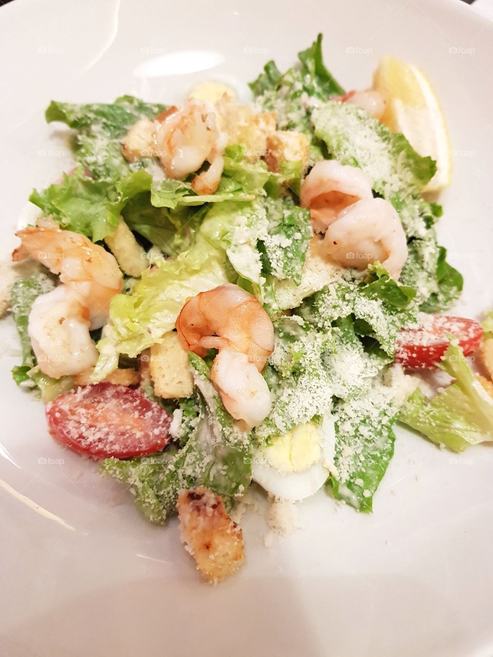 Caesar salad with shrimps.