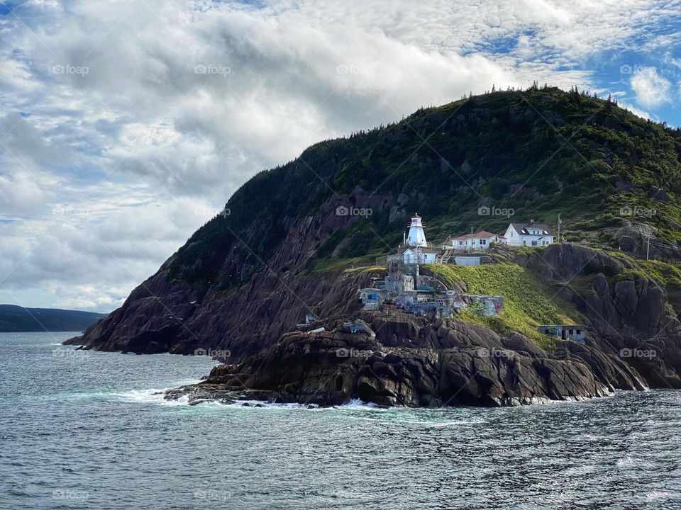 Lighthouse at the Narrows across from Signal Hill in Saint John’s Newfoundland