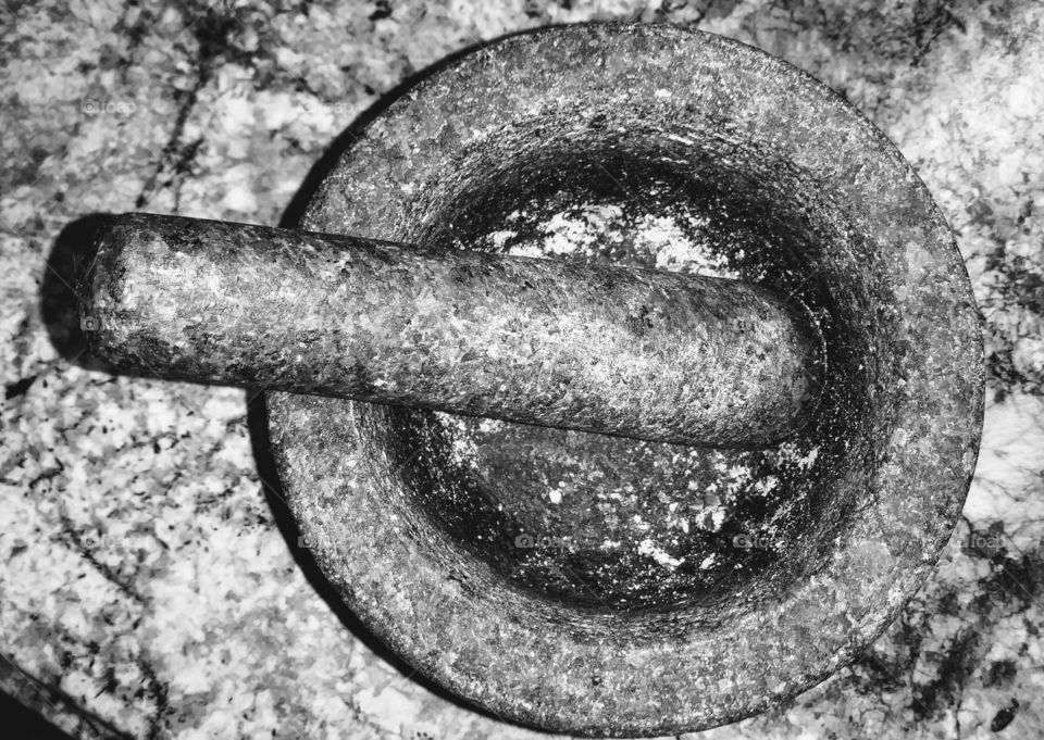 black and white mortar and pestle from above