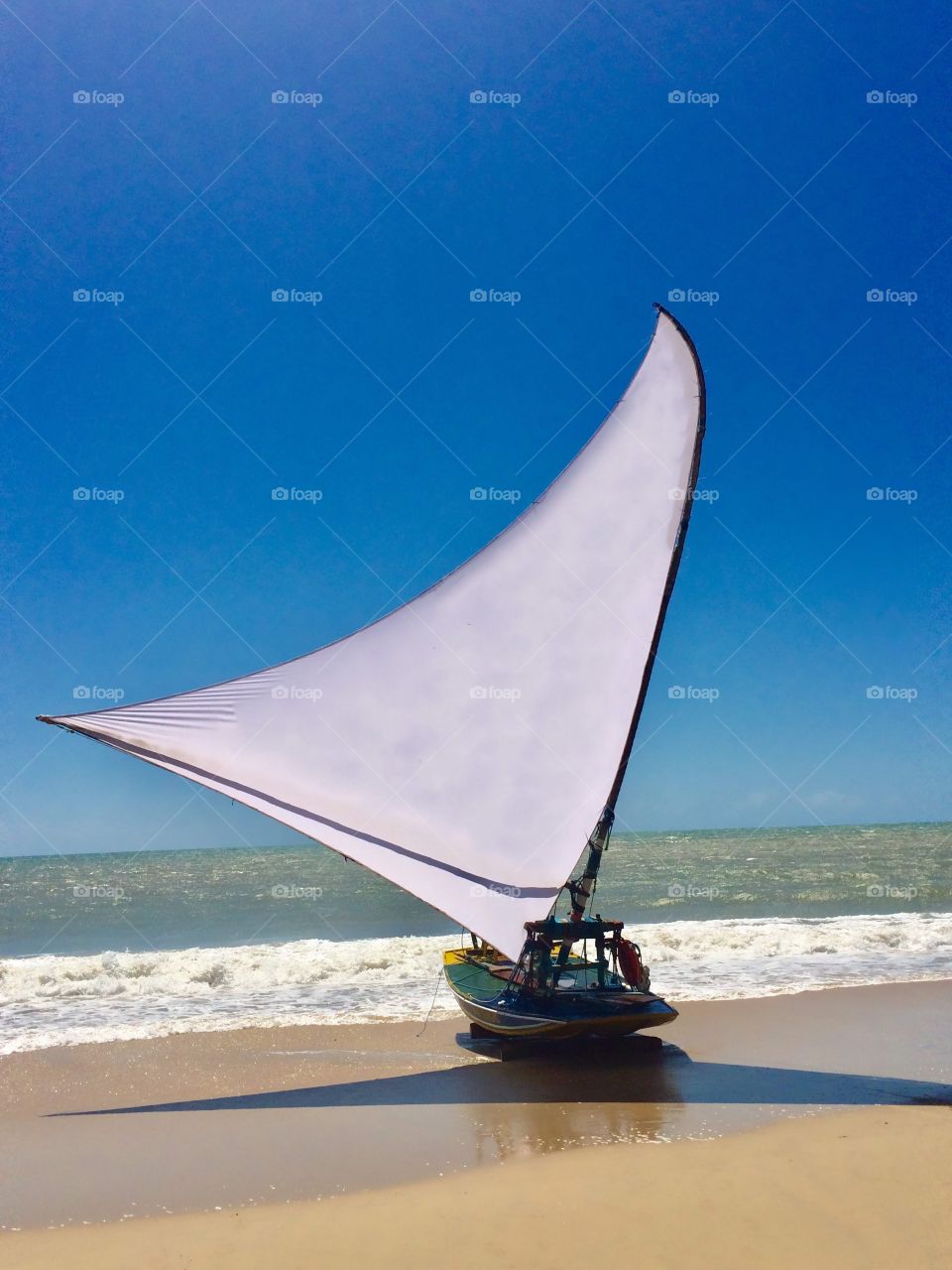 raft with white sail