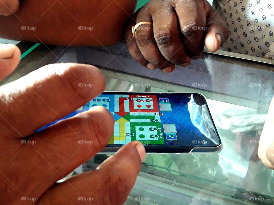 Ludo game playing in phone