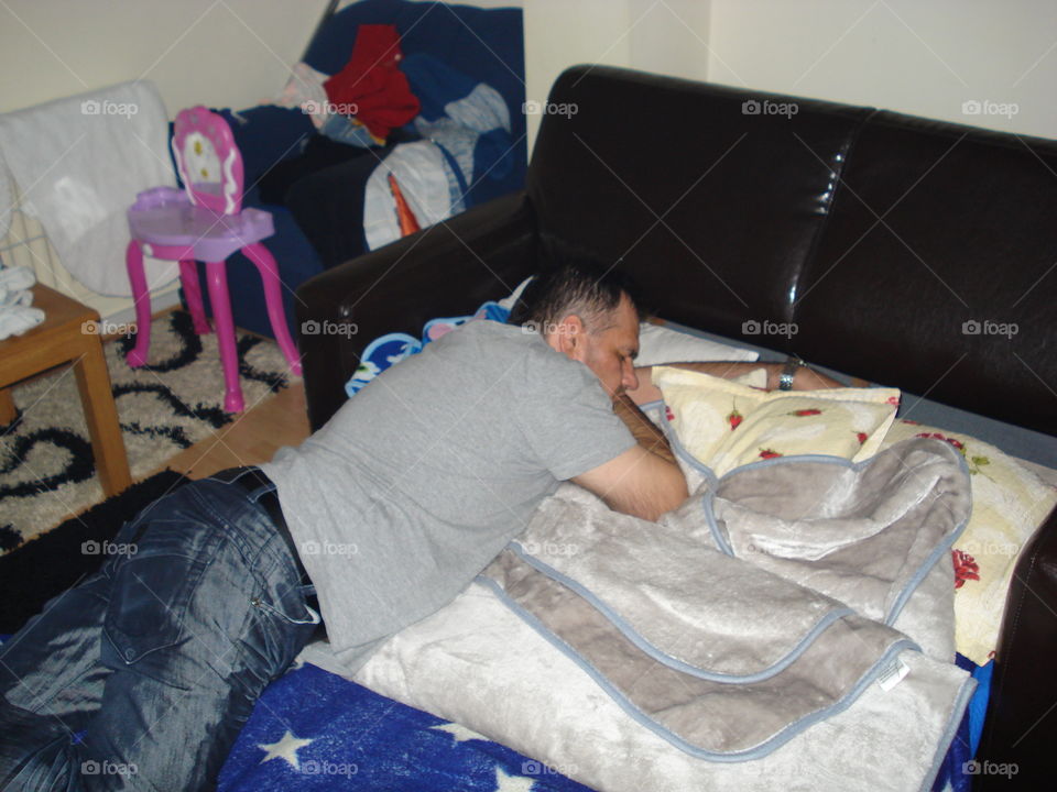 Man sleeping on bed