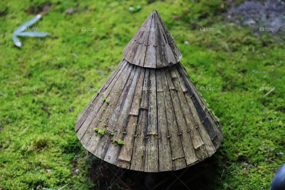 triangle shaped wood making a cone