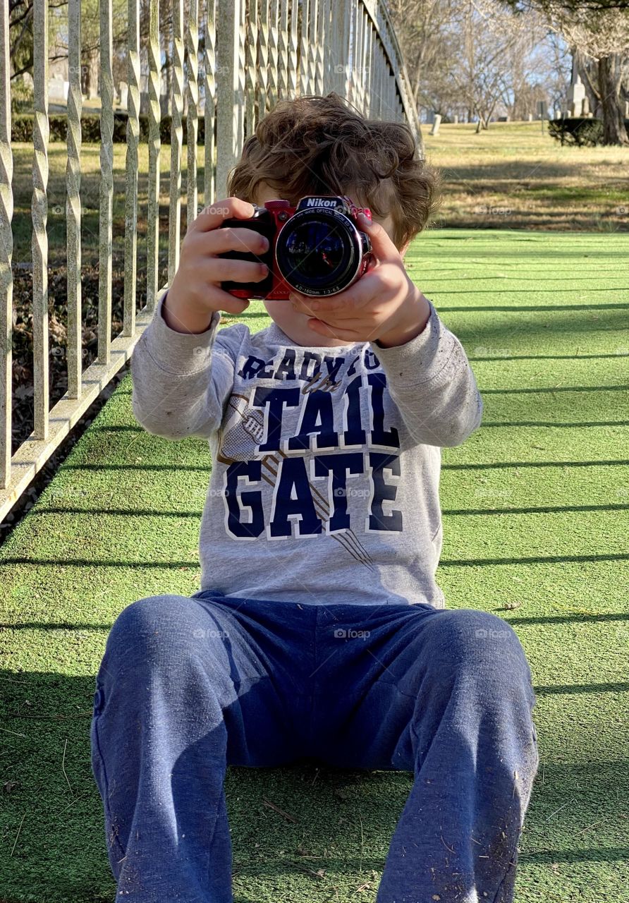 Boy taking picture 