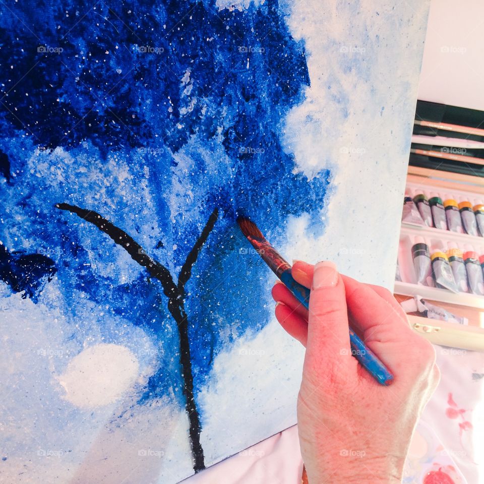 Water painting a tree