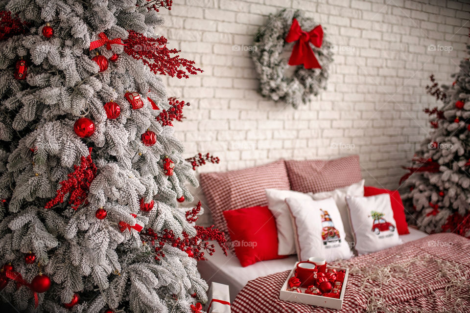 Christmas decorated pillow, festive atmosphere. Home decor.