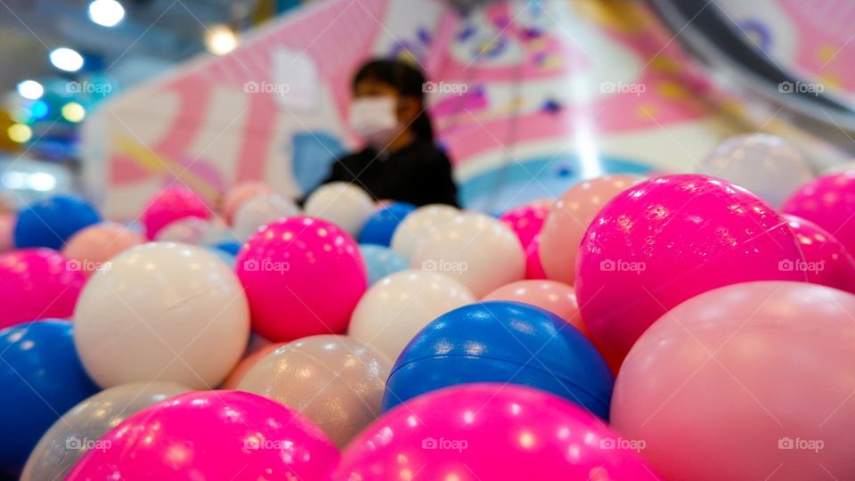 playing colorful balls on the playground