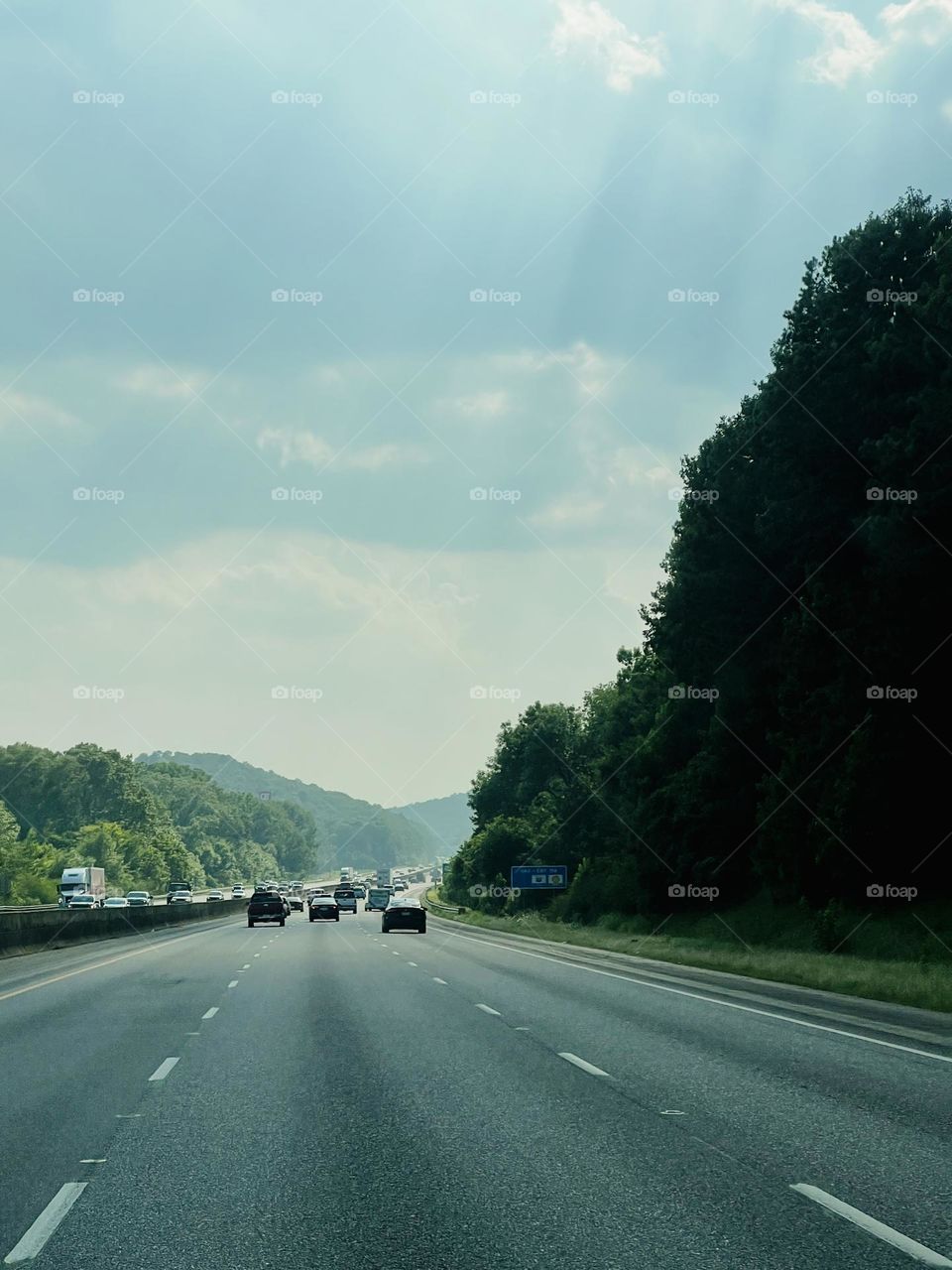 View from moving vehicle along a highway in the southeastern United States 