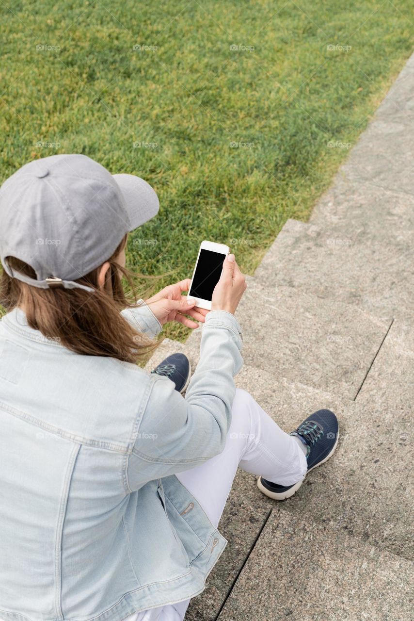 woman using smartphone