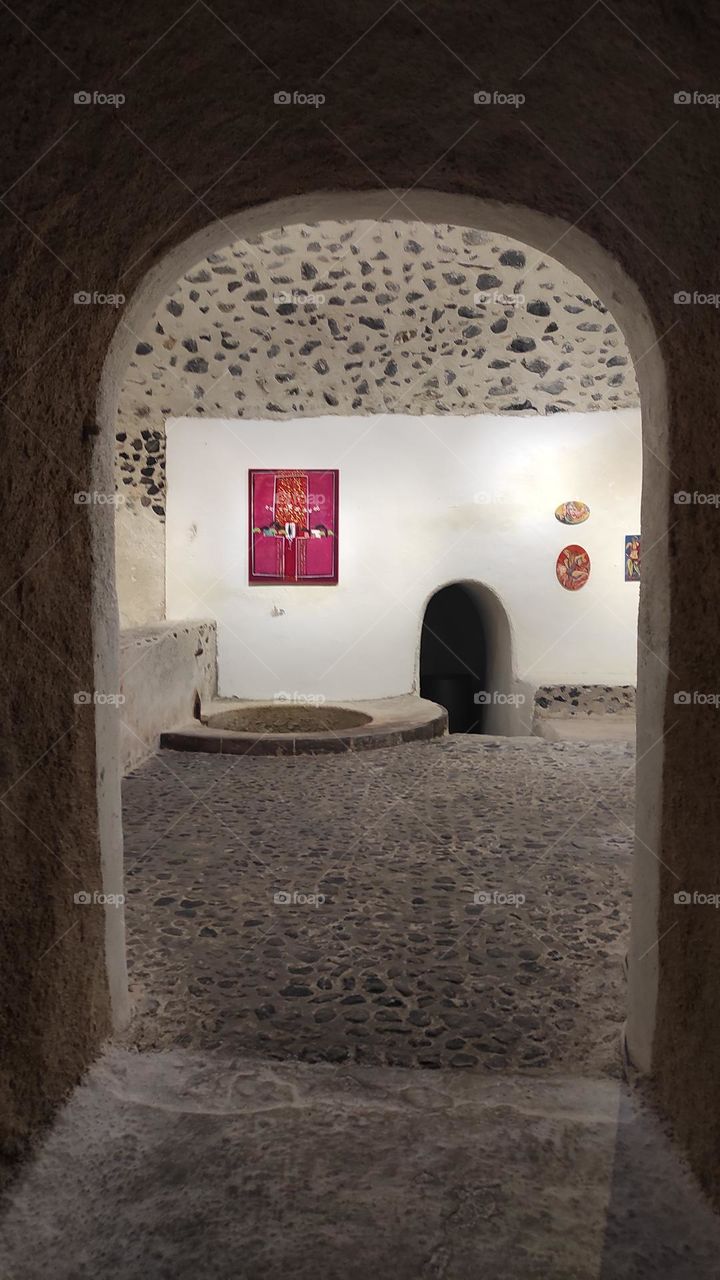 Art gallery in a cave , beautiful destination for wine tasting and art .