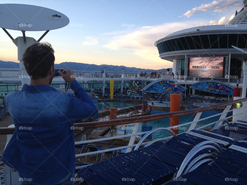 Take a picture on the boat. Royal caribben,marine e of the sea