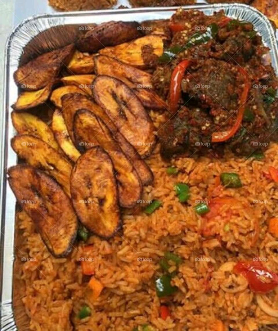 fried plantain,chicken and jellof rice...a Nigerian special delicacies
