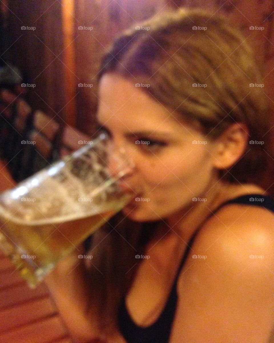 Woman drinking beer