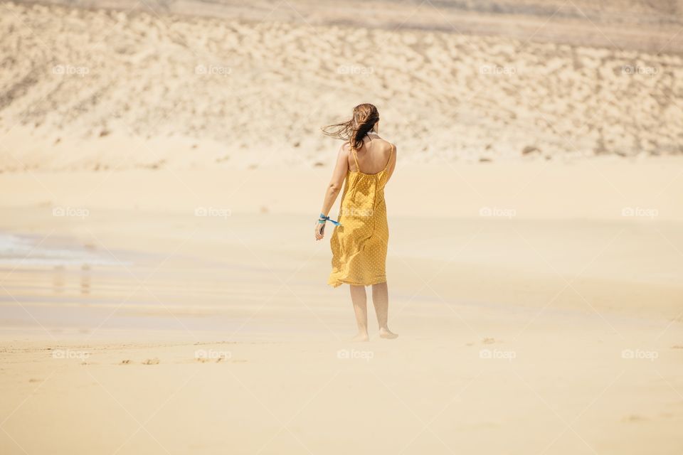 Woman in the yellow dress 