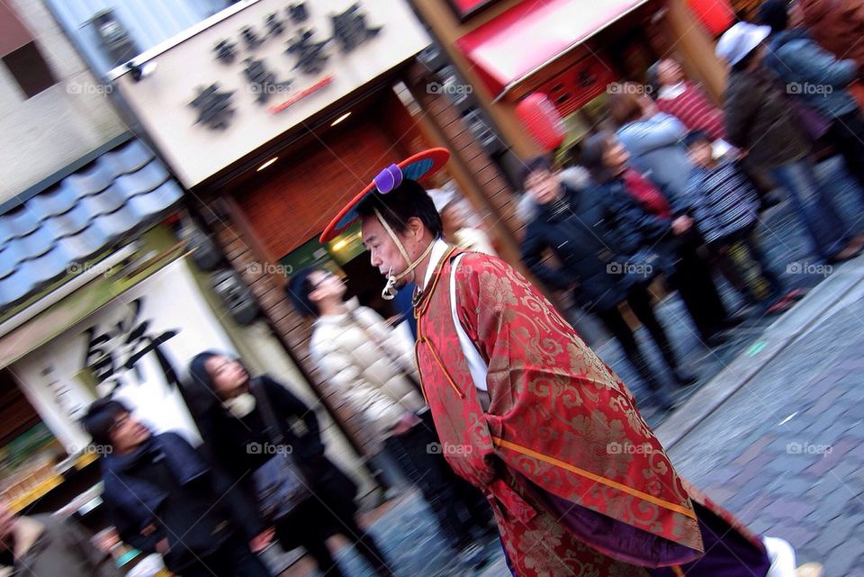 Traditional Japanese man walking