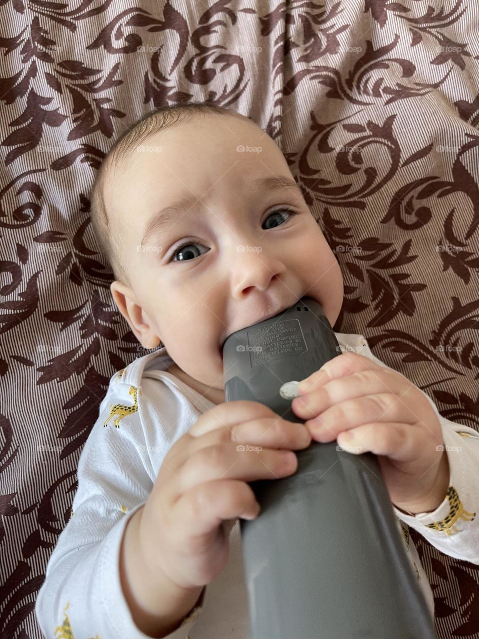 Beautiful cute baby girl with toy