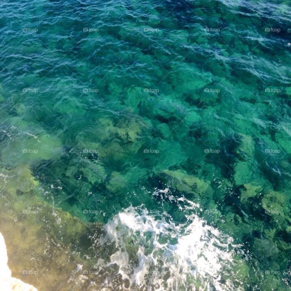 Crystal clear blue green water