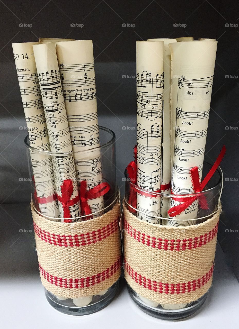 Sheet music tied up in red ribbons