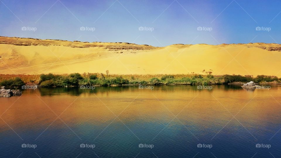 Mountain reflection on the Egyptian nile in Aswan