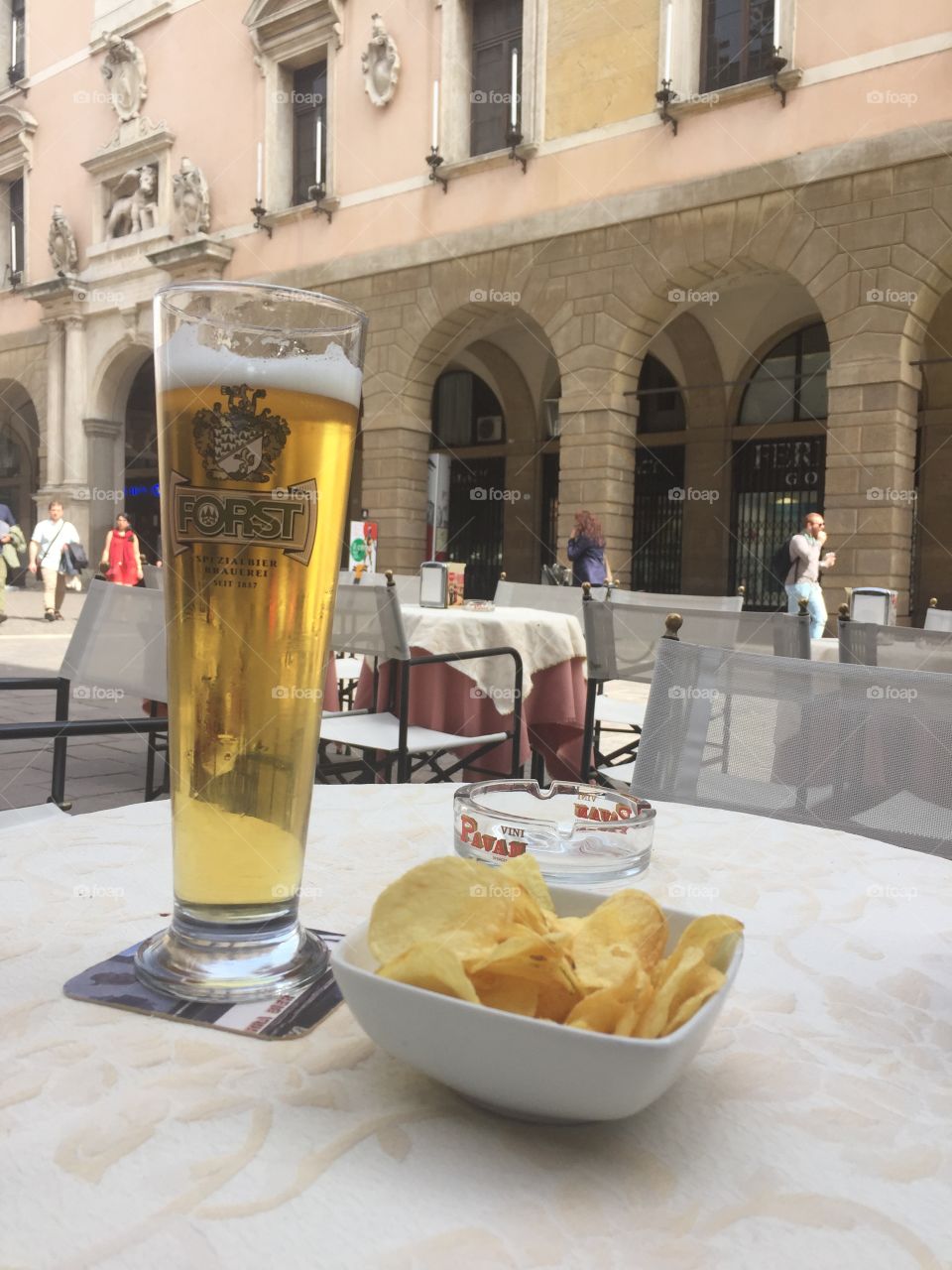 Beer and chips at outdoor restaurant