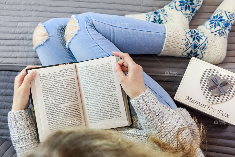 girl is reading a book