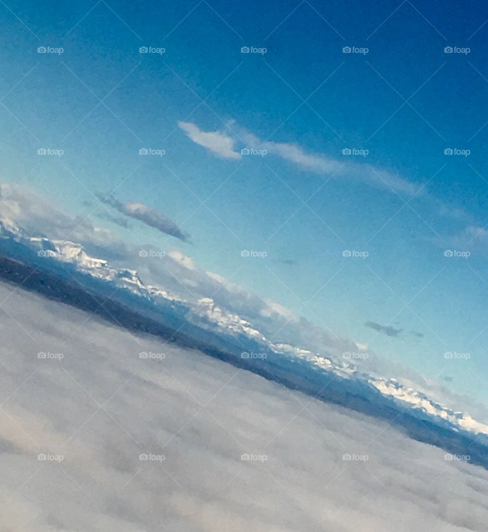 Mountain range above the clouds