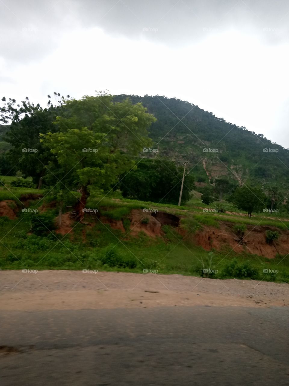 this is along the bent to Kwajji of Yorro local government of Taraba State Nigeria. this area is surrounded by mountains to the extent that when you are traveling and you approach the area, the weather tends to change automatically.