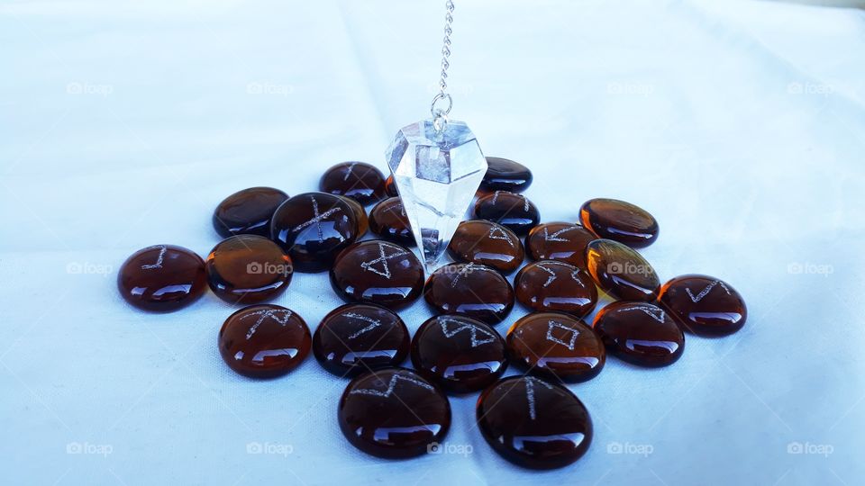 Spiritual work with runes and pendulum