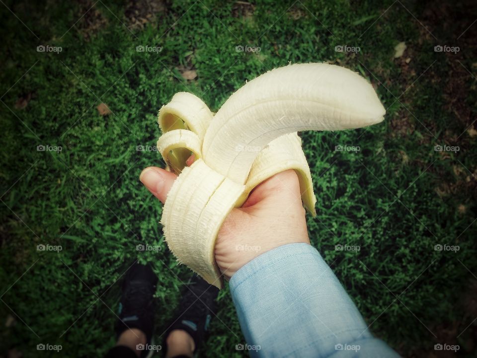 Holding a Banana